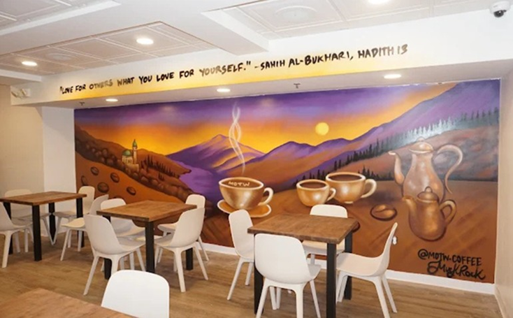 MOTW's café mural celebrating coffee culture and community